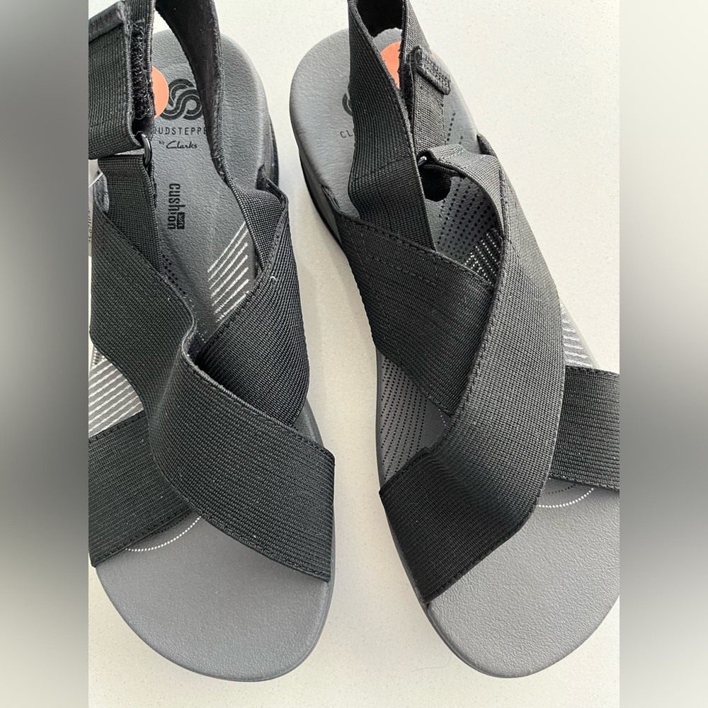 NWT Cloudsteppers by Clarks black sandals, size 7. Cushiony, velcro closure.